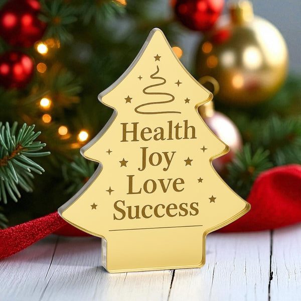 Decorative Christmas tree-shaped acrylic plaque engraved with “Health, Joy, Love, Success” and minimalist festive graphics – So Cute Cut corporate gift.

