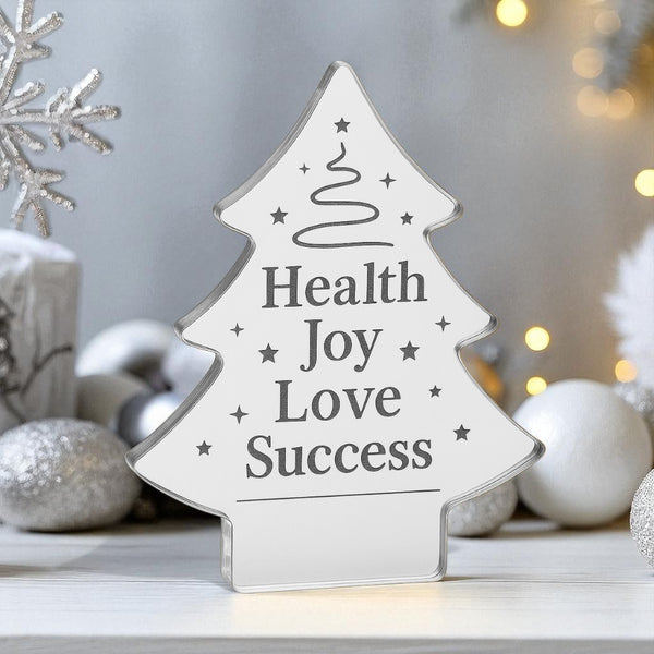 Decorative Christmas tree-shaped acrylic plaque engraved with “Health, Joy, Love, Success” and minimalist festive graphics – So Cute Cut corporate gift.

