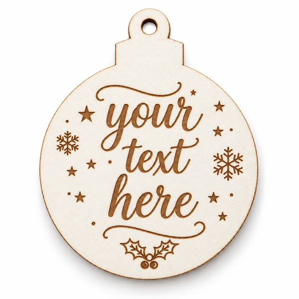 Λευκή μπάλα MDF με καλλιγραφική χάραξη «your text here» και χριστουγεννιάτικη διακόσμηση.